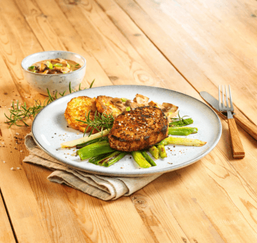 Schweinesteak mit Pilzsauce und Rösti